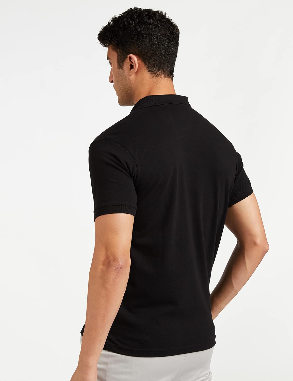 Allen Solly cotton-blend polo close-up showing the ribbed knit band collar, chest-button placket and pique-knit fabric texture