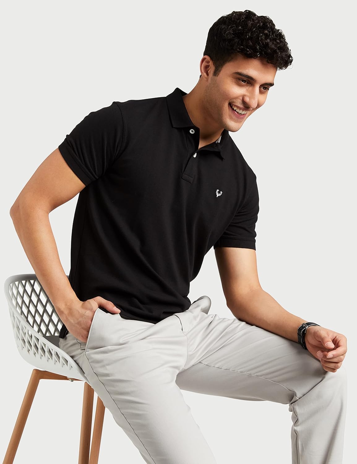 Allen Solly polo styled with chinos and white sneakers for smart-casual office and weekend wear, full silhouette
