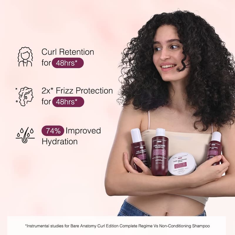 Bare Anatomy Curl-Boosting Cream Leave-In Conditioner in use