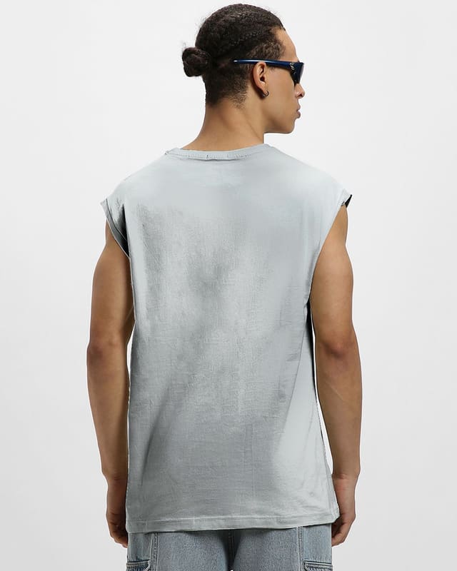 Side profile of the Bewakoof We Are Venom vest showing the dropped armhole, straight side seam and full graphic placement