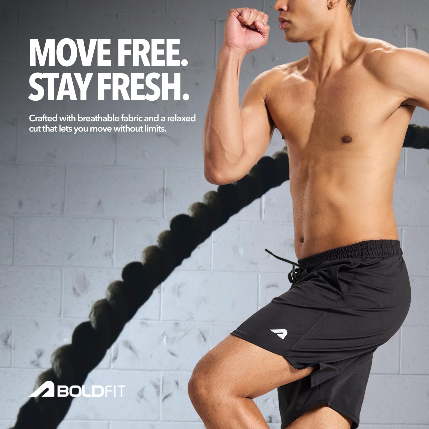Boldfit gym shorts side view highlighting the polyester-spandex stretch fabric texture and the small Boldfit wordmark on the left thigh