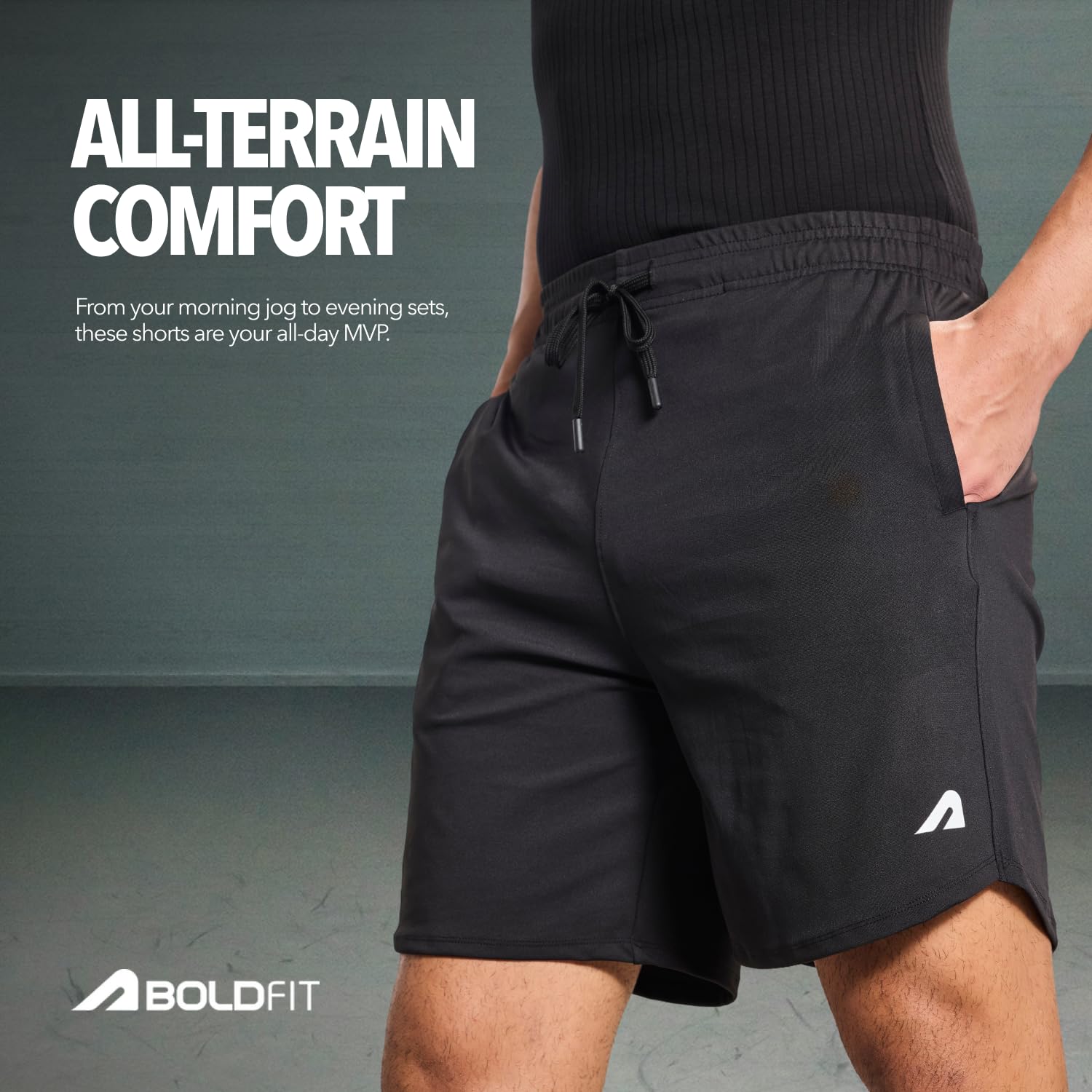 Boldfit men's lightweight gym shorts on model showing the flat-front mid-rise waistband, drawstring closure and breathable training-short fit