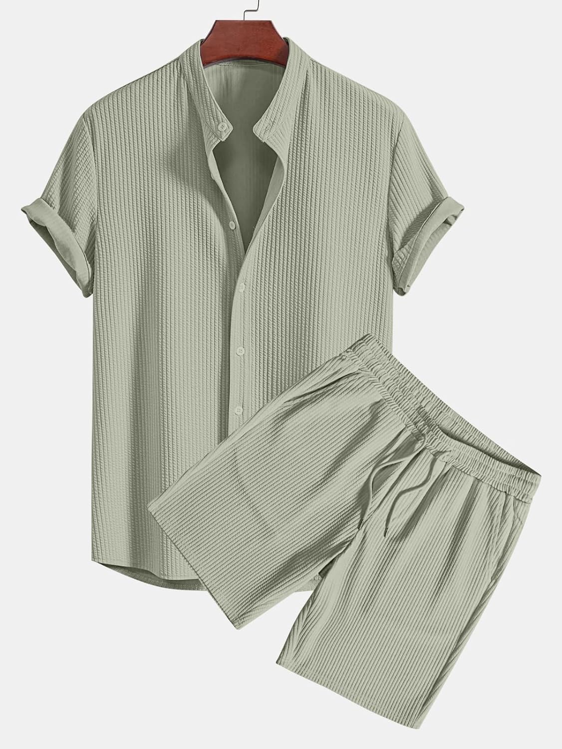 GRECIILOOKS co-ord set close-up showing the subtle geometric woven texture detail on the poly-lycra blend fabric, plus the button-down placket and shirt collar construction