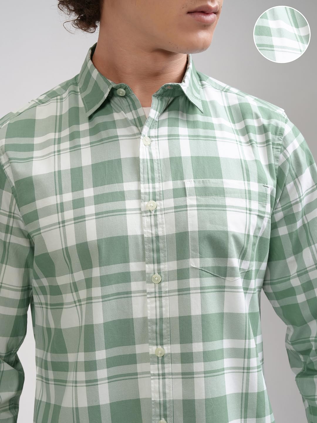 Highlander checks shirt styling shot showing the slim-fit silhouette across the four colour-on-white variants in the SKU family