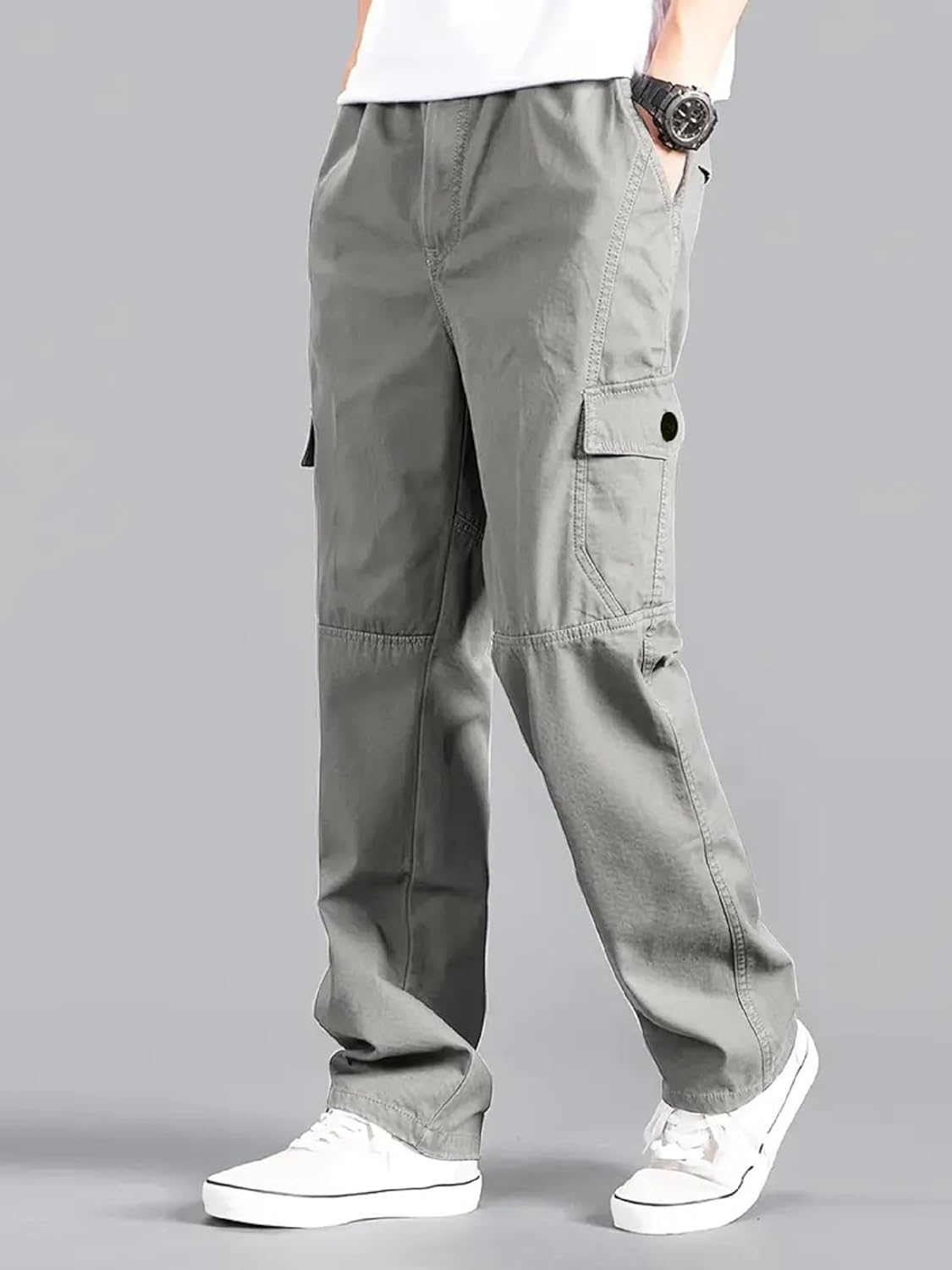 Lymio cotton cargo pant detail view highlighting the four-pocket layout — slanted front hand pockets and flapped thigh cargo pockets