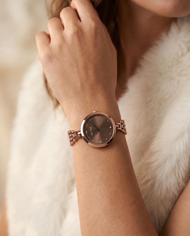 Matrix Daisy WN-106 worn on a woman's wrist against a white fur collar