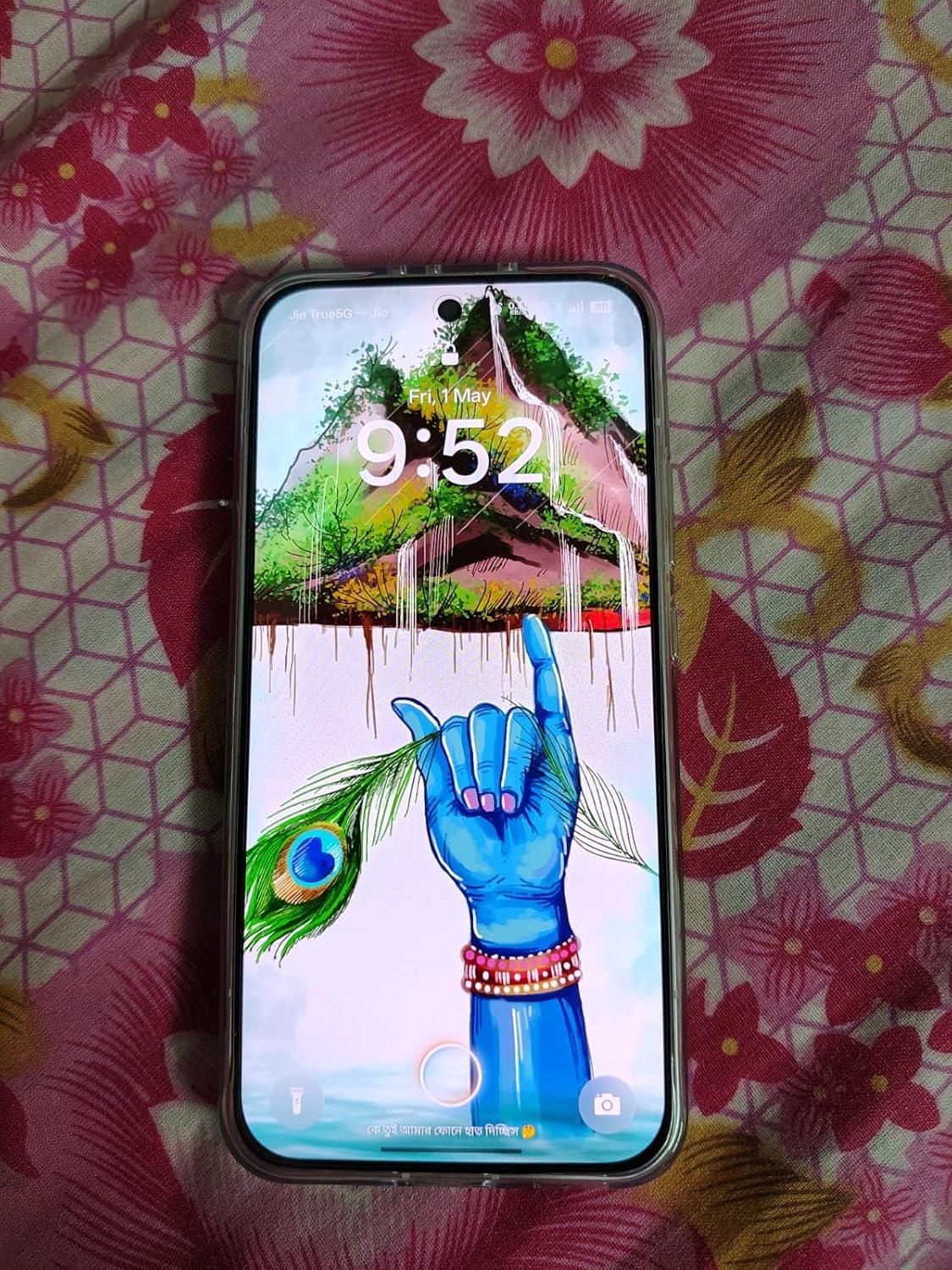 OPPO Reno15 Pro mini 5G in Glacier White lifestyle shot demonstrating the 187 g compact form factor versus a typical 6.7-inch flagship slab