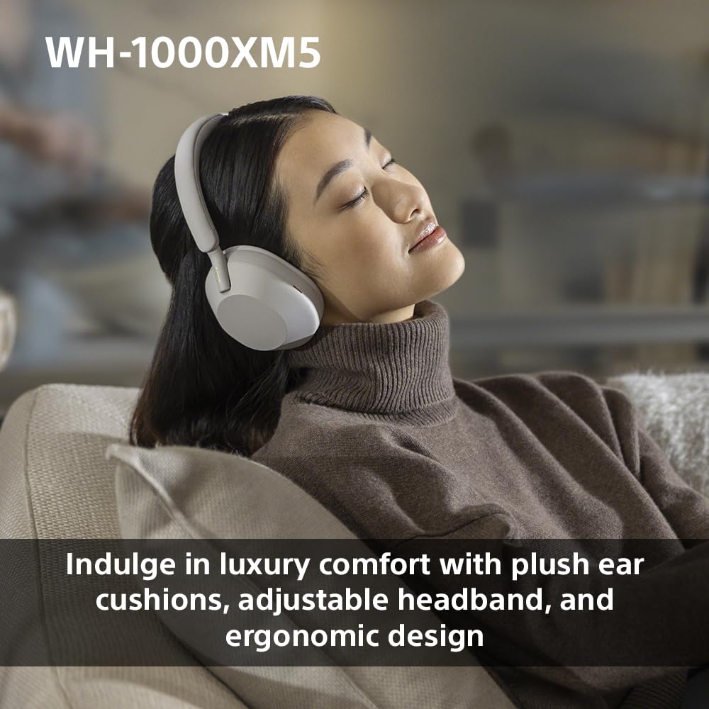 Sony WH-1000XM5 detail shot of the left earcup buttons and headband stitching