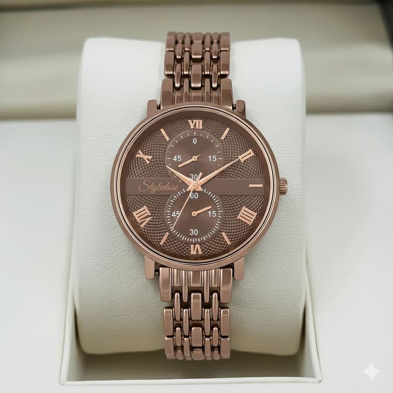 Styledose ST 1 front view showing the sub-dial style brown face and rose-gold-tone hands