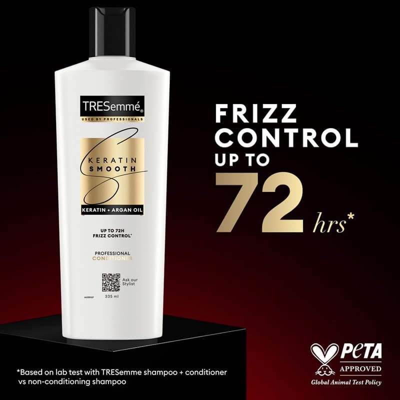 TRESemmé Keratin Smooth Anti Frizz Conditioner 335ml in use